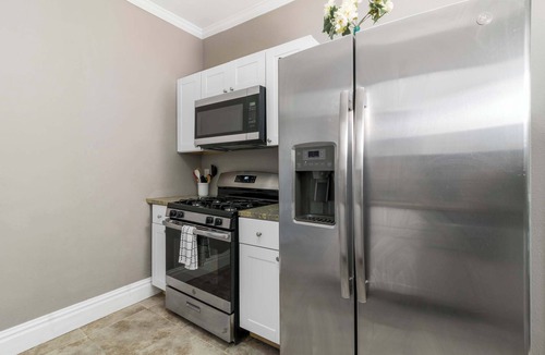 Tower Grove East Apartment | Comfortable 2BR Stay with Dedicated Workspace & Yard