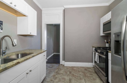 Tower Grove East Apartment | Comfortable 2BR Stay with Dedicated Workspace & Yard
