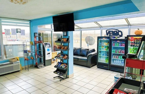 Madisonville Hotel | Convenient Room with King Bed and Microwave and Fridge for a Comfortable Stay