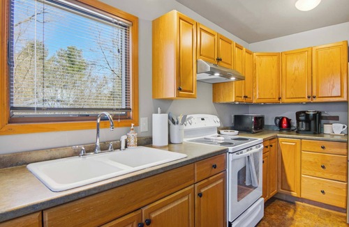 Alden House | Cottage Near Torch Lake | Downtown Alden