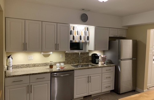 Lansing House | Cottage11: 2 Bedroom-3 beds. Laundry, Sleeps 6. Park right at your Entry Door.