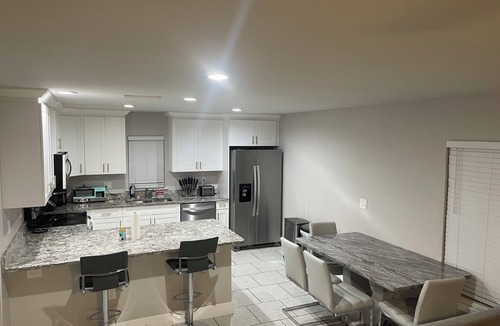 Centennial House | Cozy 2-bedroom house in serene Lehigh Acres Wifi Included.