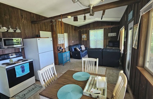 Allegan Cottage | Cozy 2-bedroom Waterfront Cottage with 80' dock on 2.5 Acres. Privacy Galore!
