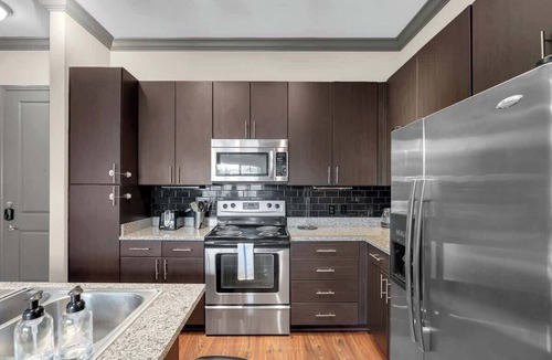 Brady Arts District Apartment | Cozy 2BR Near BOK Center-Gym, Pool, Pet Frndly