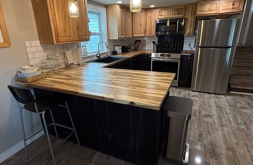 Pentwater Cottage | Cozy 3-bedroom cottage, large yard, minutes from Lake Michigan. Pet friendly.