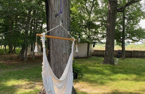 Pentwater Cottage | Cozy 3-bedroom cottage, large yard, minutes from Lake Michigan. Pet friendly.