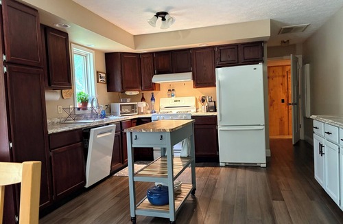 East Jordan House | Cozy 4br 3 bath home with acreage and a creek just minutes from Boyne Mountain