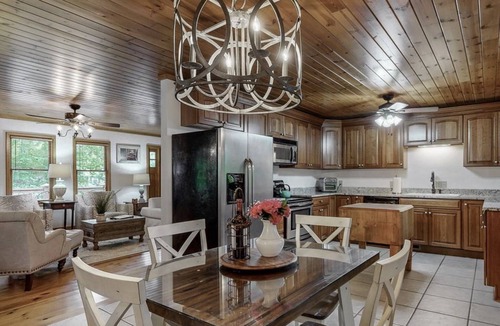 Mirror Lake Cabin | Cozy Cabin In-town by Mirror Lake-1.7 miles to Main St, Hot tub, & fireplace!