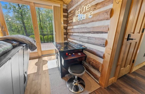 Blakeslee Cabin | Cozy Cabin, Sauna! Hot Tub! Filtered Lake Views!
