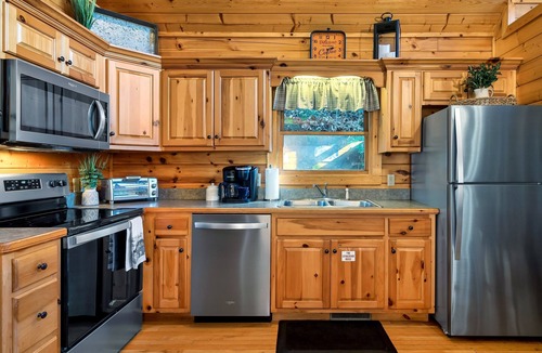 Black Bear Falls Cabin | Cozy Cabin with Hot Tub, Stream, and Prime Smoky Mountain Location