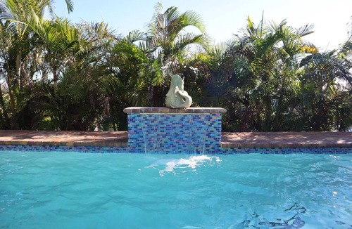 Bayshore Gardens House | Cozy canal cottage with pool, dock, Gulf access and minutes to Anna Maria Island
