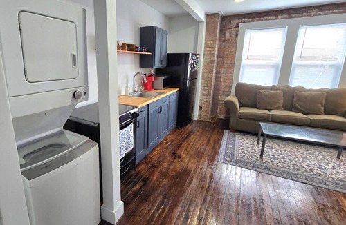 Detroit Apartment | 🛋️ Cozy Meets Contemporary Modern one bedroom with Fireplace & Smart TV – The Gratiot