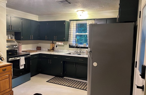 Tallassee House | Cozy mountain getaway with hot tub and fenced in yard
