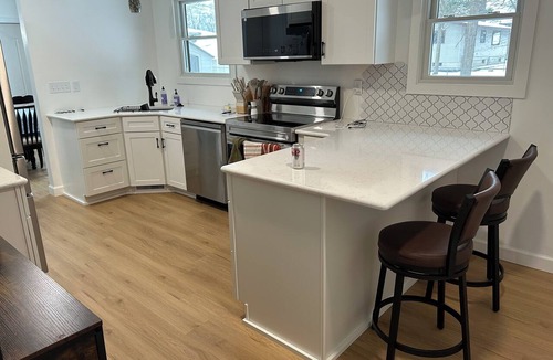 Midland House | Cozy, newly renovated home with a gorgeous fireplace and office space.