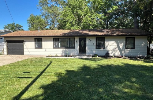 Midland House | Cozy, newly renovated home with a gorgeous fireplace and office space.