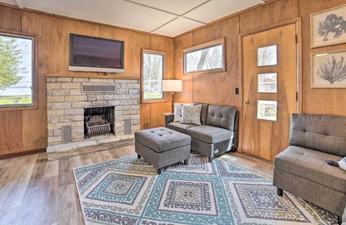 Cheboygan County Cottage | Cozy Petoskey Area Retreat on Burt Lake Access!