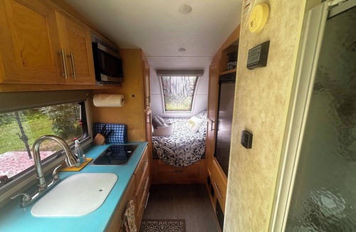 Janesville House | Cozy RV on 149 acres in Charleston with AC, WiFi, and eight miles of trails!