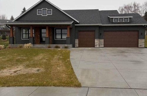 Rochester House | Custom Luxury Rambler in Highland Hills, Rochester