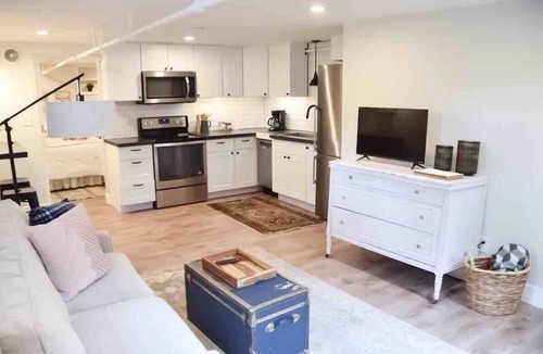 Evansville Apartment | Digs 5 of 5: 1BDRM Open & Airy Garden Suite with Private Parking & More!