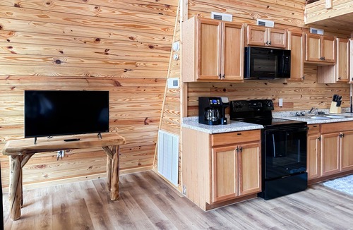 Newport Cabin | Dog-friendly A-frame cabin with loft, balcony, full kitchen, & washer/dryer