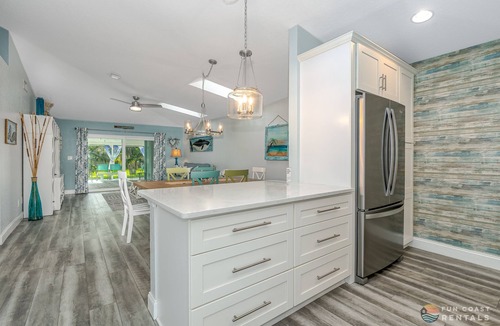 New Smyrna Beach House | Dog Friendly Home w/Private Fenced Yard, Garage & Fire Pit. STEPS to the Beach!