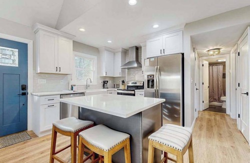 Fletcher House | Dog-friendly home with deck, gas fireplace, central AC, & washer/dryer