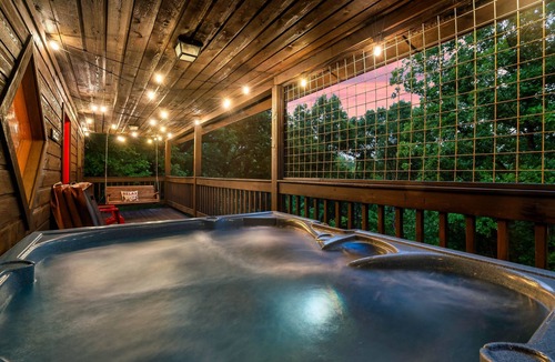 Sevierville Cabin | Dog Friendly-Private-Hot Tub-Pool Table-Treetop View-King Bed-FP-Easy Drive