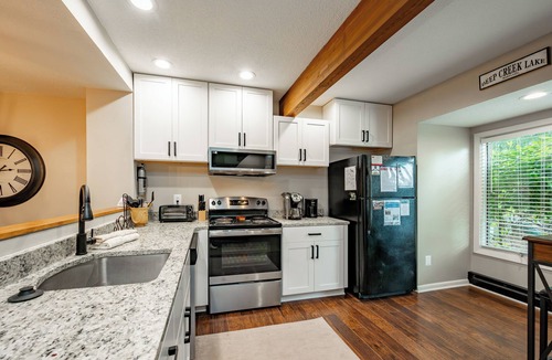 McHenry House | Dog Friendly Townhome w/Hot Tub & Game Room