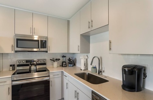 North Trail House | Downtown Oasis: Poolside Condo, Patio & Gym