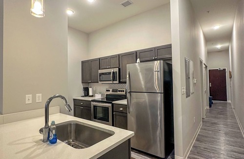 Gateway District Apartment | Downtown Oasis: Steps to Dining & Sights. Pool + Gym in Building