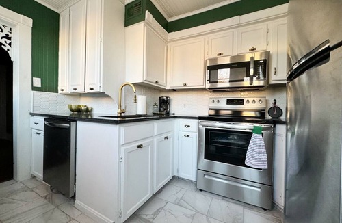 Evansville Apartment | Downtown Spacious Apt with king bedroom, Formal Dining, and balcony!