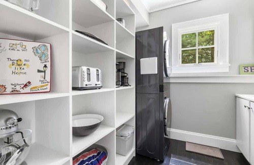 Michiana House | Eclectic Art, Antiques & Gym in Fab MI Retreat