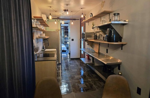 Wagoner House | Eco-Chic Container Tiny Home + Treehouse Deck