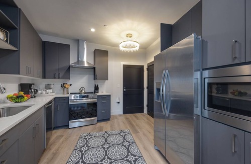 West End Condo | Elegant Corner Penthouse with Private Balcony, Skyline Views, Pool, and Gym