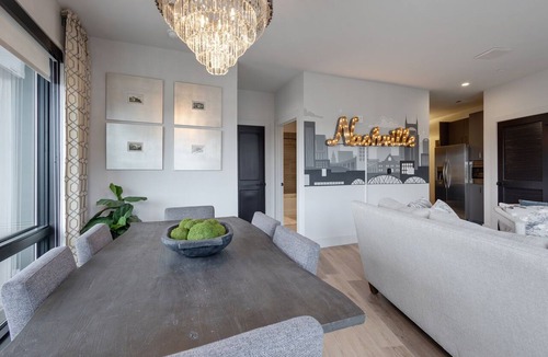 West End Condo | Elegant Corner Penthouse with Private Balcony, Skyline Views, Pool, and Gym