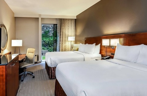 Executive Park Hotel | Enjoy a Hassle-Free Stay! 2 Contemporary Units, Pet-friendly, Parking, Pools!