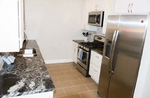 Ludington Condo | Enjoy the warm Summer Breeze in this modern 3BR, 2BA Downtown Condo