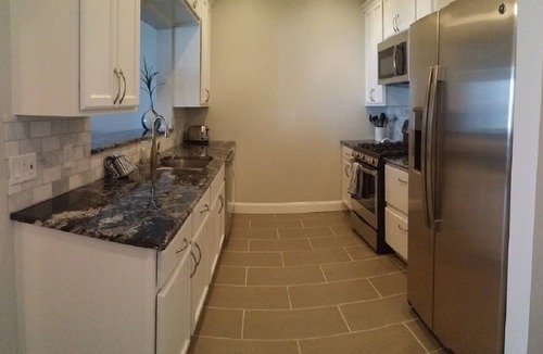 Ludington Condo | Enjoy the warm Summer Breeze in this modern 3BR, 2BA Downtown Condo
