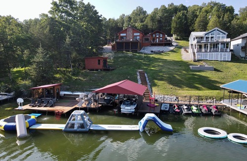 Williamstown Cabin | Epic Family Lake Getaway - 5 Min to Ark, Gameroom, 100ft Dock, Hot Tub, Sauna