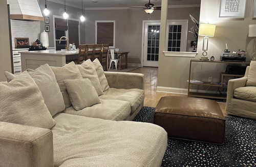 Oxford House | Escape to Serenity: Cozy Ranch Style Home with Charming Wrap-Around Porch.