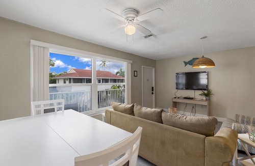 Mid Island Apartment | Estero Island Getaway - Palm Terrace 2B