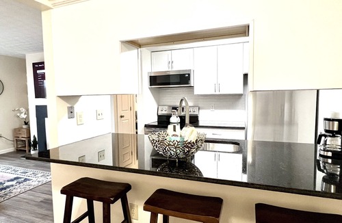 Vandalia Condo | Executive Condo: King primary en-suite! A part of the Uptown Collective Suites