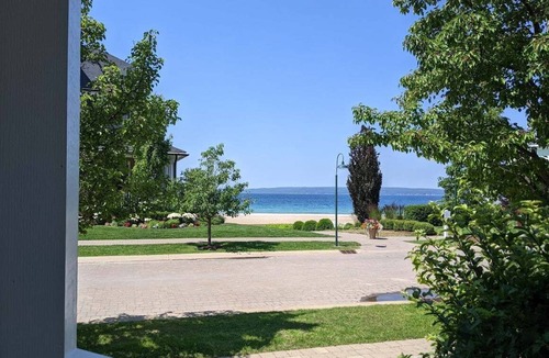 Bay Harbor House | Experience luxury in this 4-bedroom home with stunning lake views in Bay Harbor.