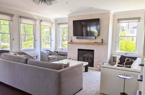 Bay Harbor House | Experience luxury in this 4-bedroom home with stunning lake views in Bay Harbor.