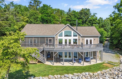 Dublin House | Experience the perfect blend of rustic charm and modern luxury in this Claytor lakefront retreat