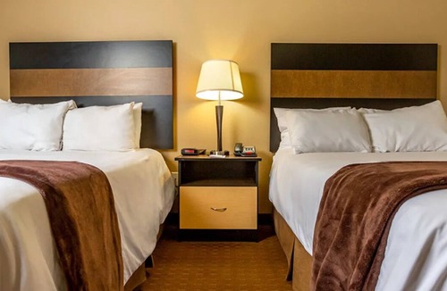 Dickinson Hotel | Extra Space, Extra Fun – 2 Full Beds Suite Perfect for Families & Weekend Escape