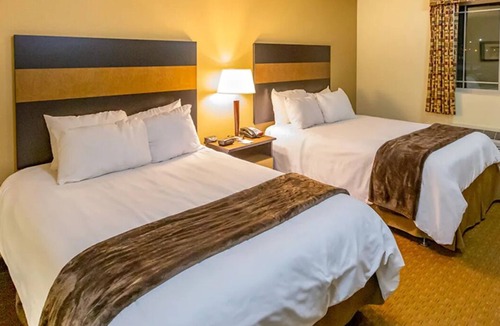 Dickinson Hotel | Extra Space, Extra Fun – 2 Full Beds Suite Perfect for Families & Weekend Escape