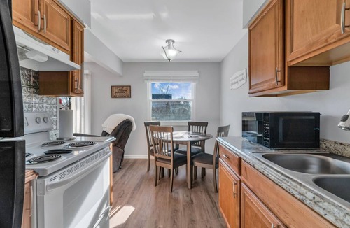 Lake Fenton Apartment | Fenton Flats- Suite 1 With On Site Hot Tub and Personal Garage