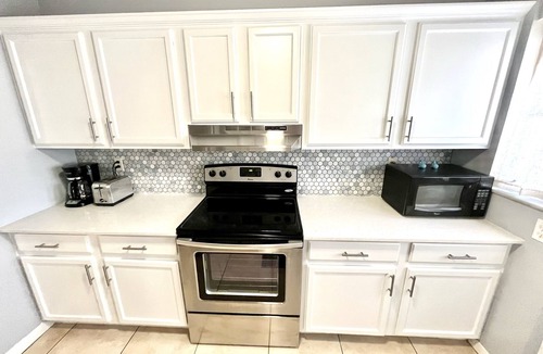 West Palm Beach House | FREE Heated Pool, Weber Gas Grill, 3 miles to the beach!