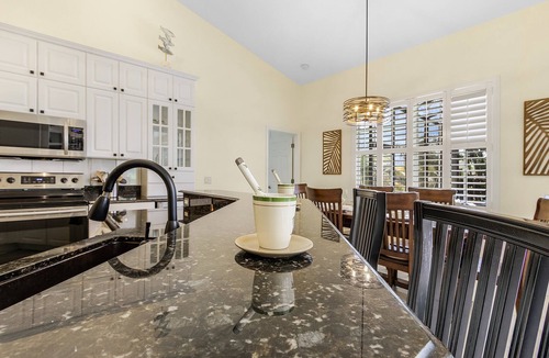 Trafalgar House | Freshwater Canal, Bicycles, Heated Pool - Casamigos - Roelens Vacations